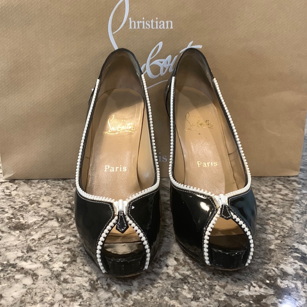 Authentic Christian Louboutin “Caracolo Plateau”Black Leather Peep Toe Heels